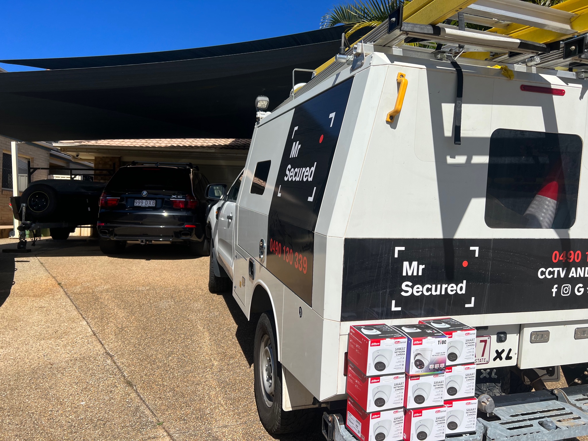 Mr Secured Work Van With CCTV Boxes On Back Ledge